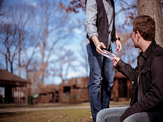 Sharing indirectly by handing out tracts.
