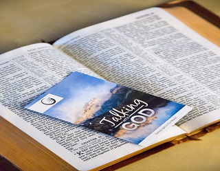 Passing out Gospel tracts.